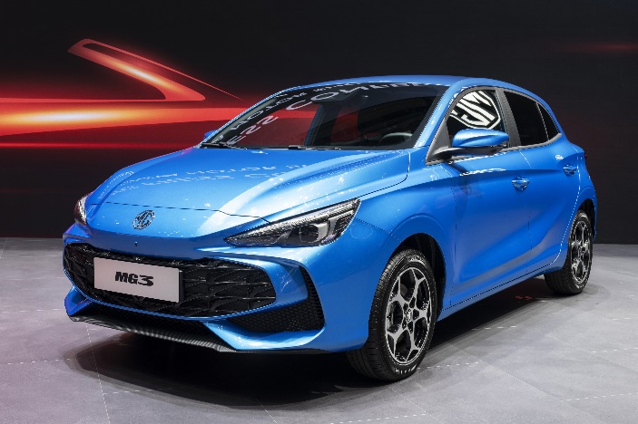 A blue car parked in a showroom

Description automatically generated